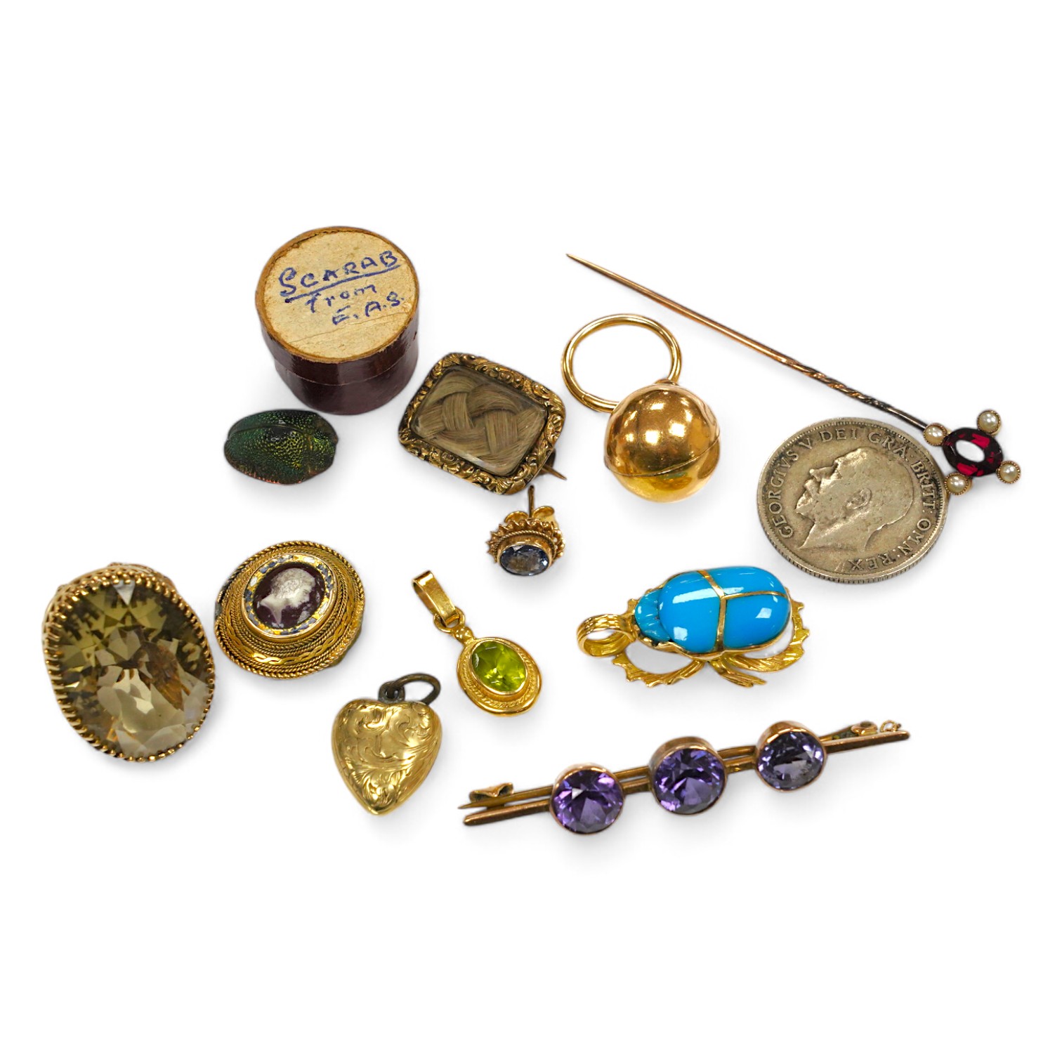 Assorted jewellery etc. including a modern 9ct gold and citrine fob, Victorian mourning brooch and a scarab beetle. Condition - poor to fair